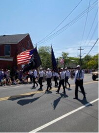 Members of the Veterans of Foreign Wars Post 8300 lead the Bellport Memorial Day Parade.